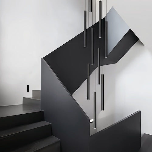 Elegant floating symphony staircase foyer chandelier with sleek black pendants in modern design.