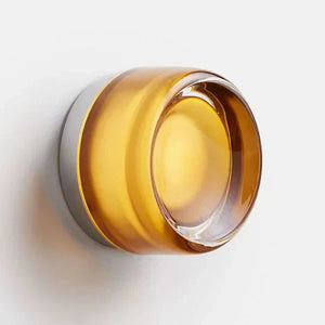Acrylic wall sconce lighting with warm white glow, ideal for kitchen, bathroom, or cafe.