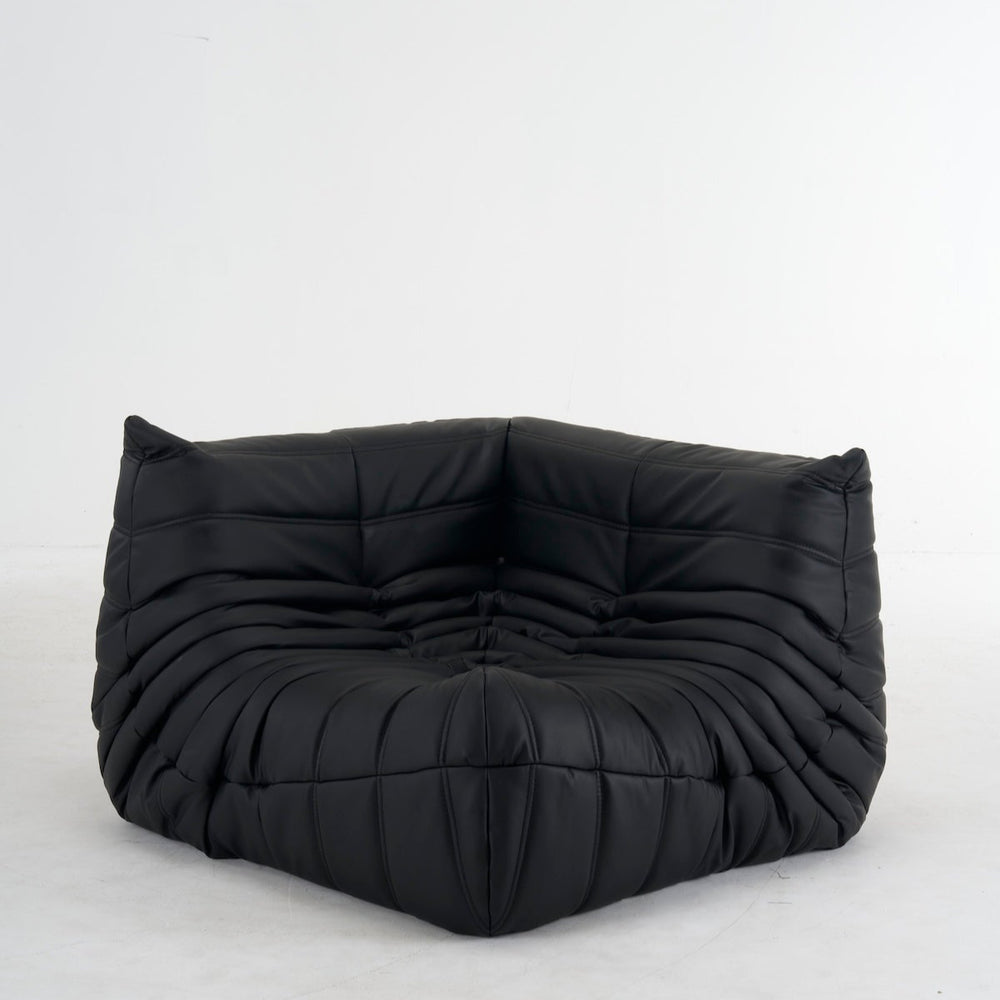 Luxurious leather Togo corner sofa in black, customizable colors, ergonomic design.