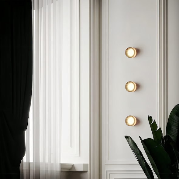 Modern bathroom with stylish wall sconce lighting.